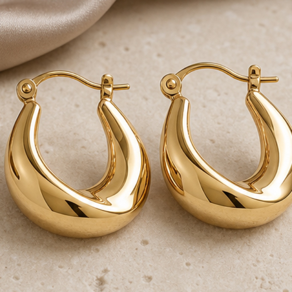 Close detail of the Lumière Hoop Earrings