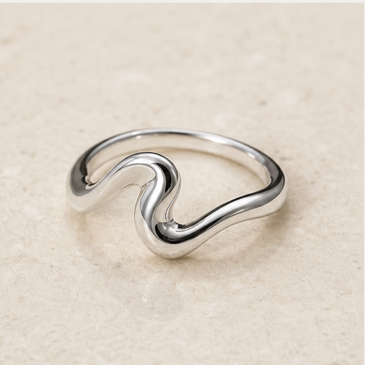 Orbit Stacking Ring styled on warm stone