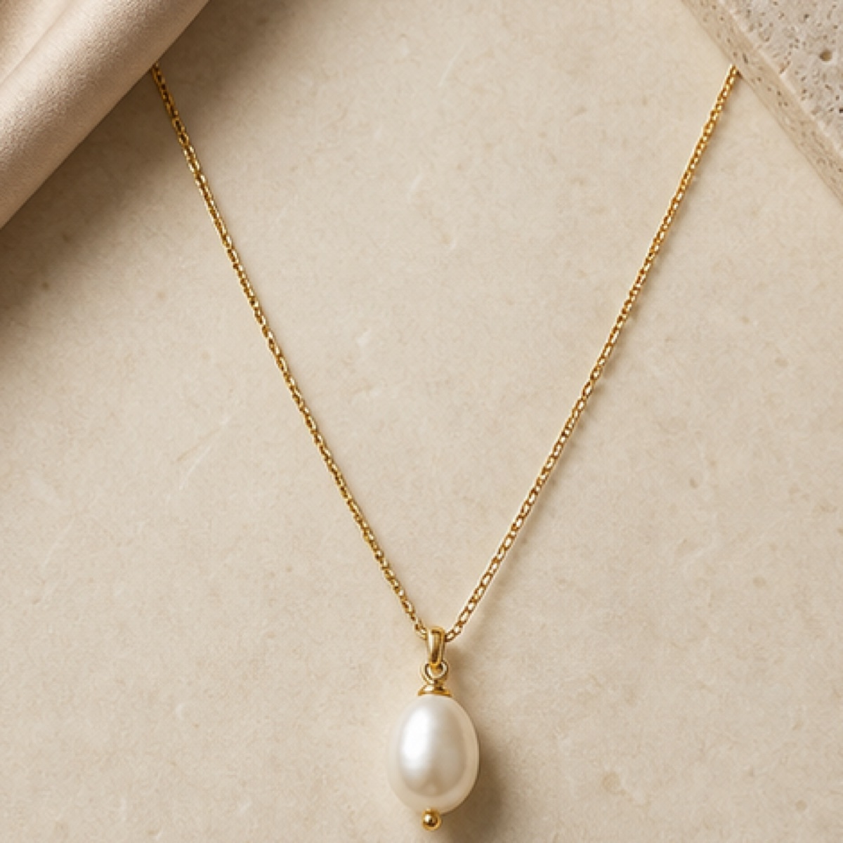 Close detail of the Pearl Drop Necklace