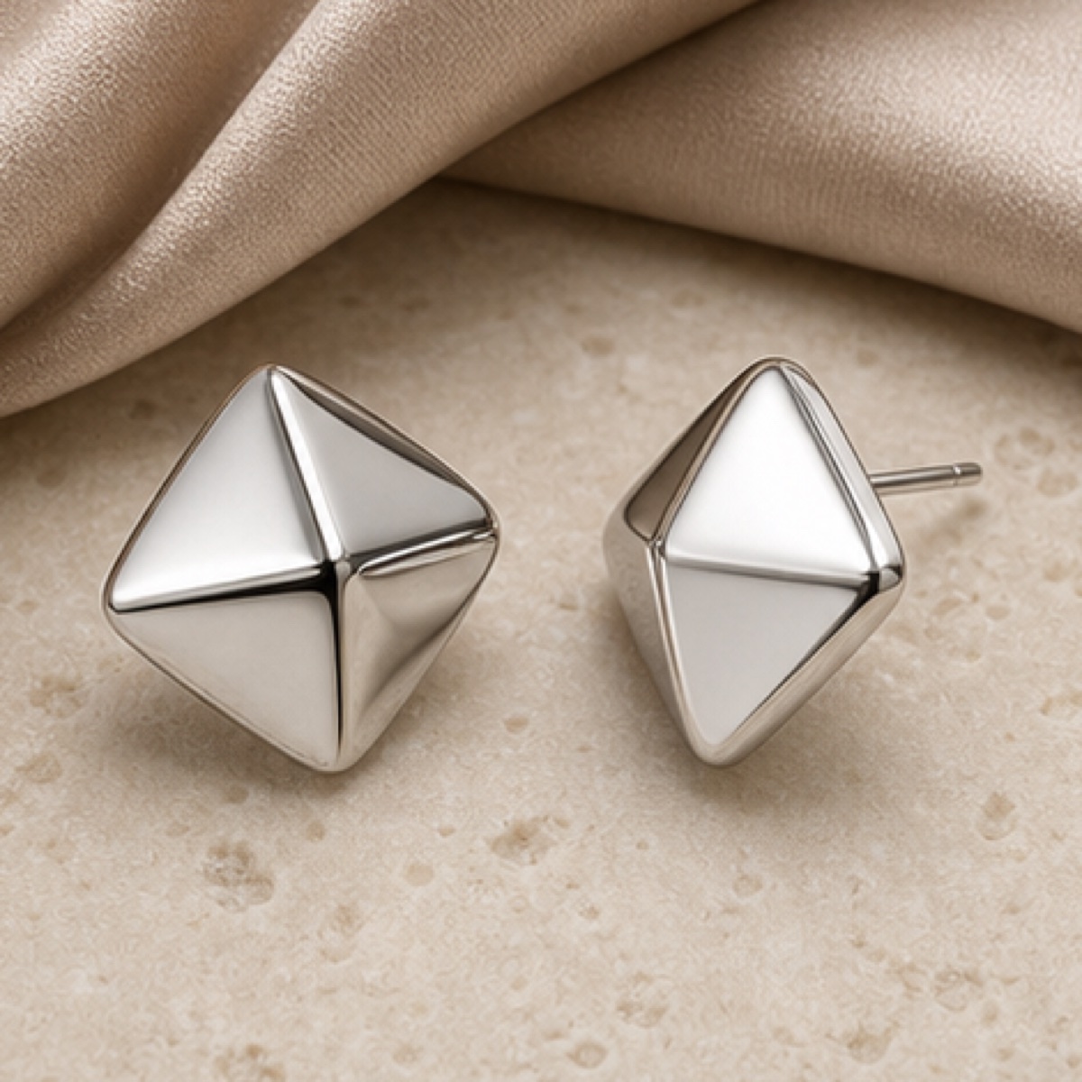 Close detail of the Sculpted Drop Earrings